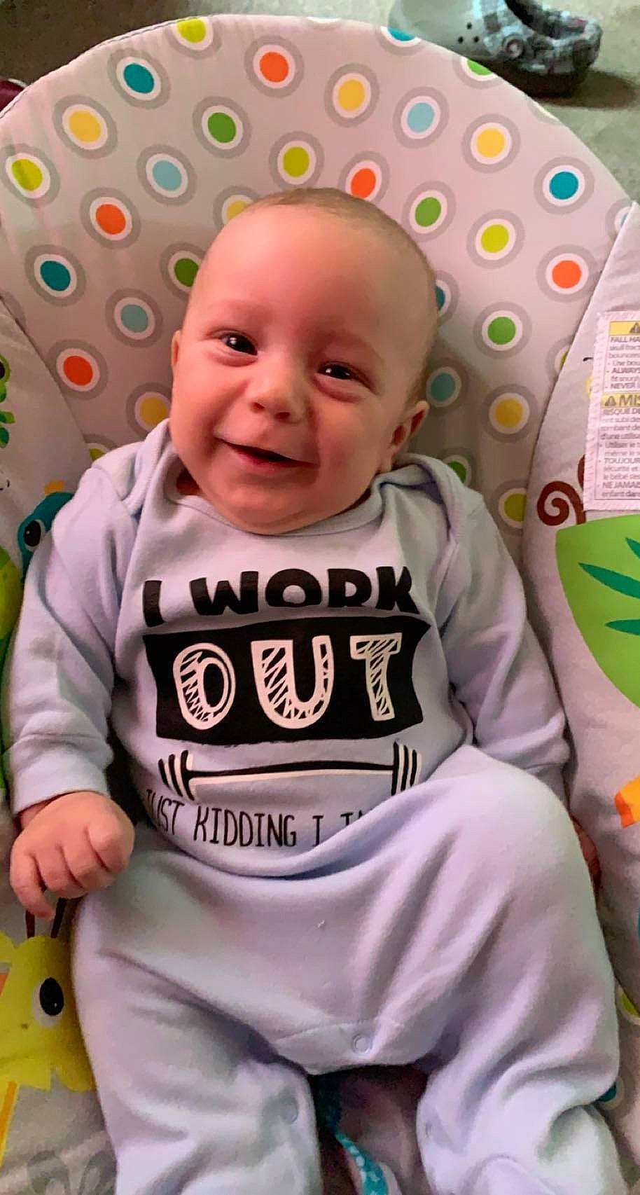Braxtyn is registered to the contest to win money with this photo: baby, baby_products, baby_toddler_clothing, cheek, child, eye, face, facial_expression, fun, happy, head, joy, outerwear, person, pink, product, skin, sleeve, smile, t_shirt