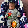 Aziel joined the competition — help win amazing prizes! baby, infant, child, toy, teething_toy, blanket, unicorn, pattern, sitting, clothing, onesie, foot, hand, face, expression, indoor, couch, comfort, cute, colorful