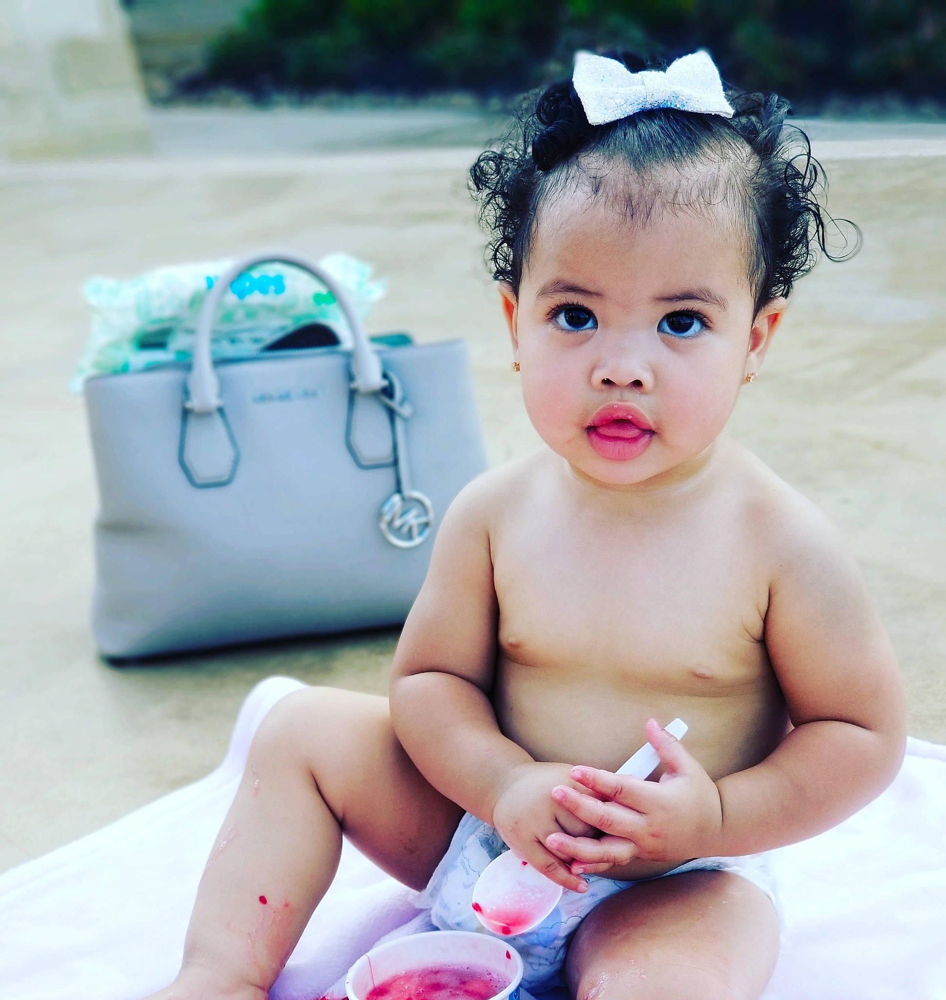 Kensleigh joined the competition — help win amazing prizes! baby, baby_products, baby_toddler_clothing, bathing, beauty, cheek, child, ear, fashion_accessory, hair_accessory, hand, headgear, leg, person, photography, play, product, skin, smile, summer