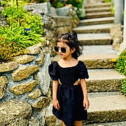 Ivana is registered to the contest to win money with this photo: accessories, child, clothing, dress, face, female, girl, head, jar, path, person, photography, plant, planter, portrait, pottedplant, rock, sleeve, sunglasses, walkway