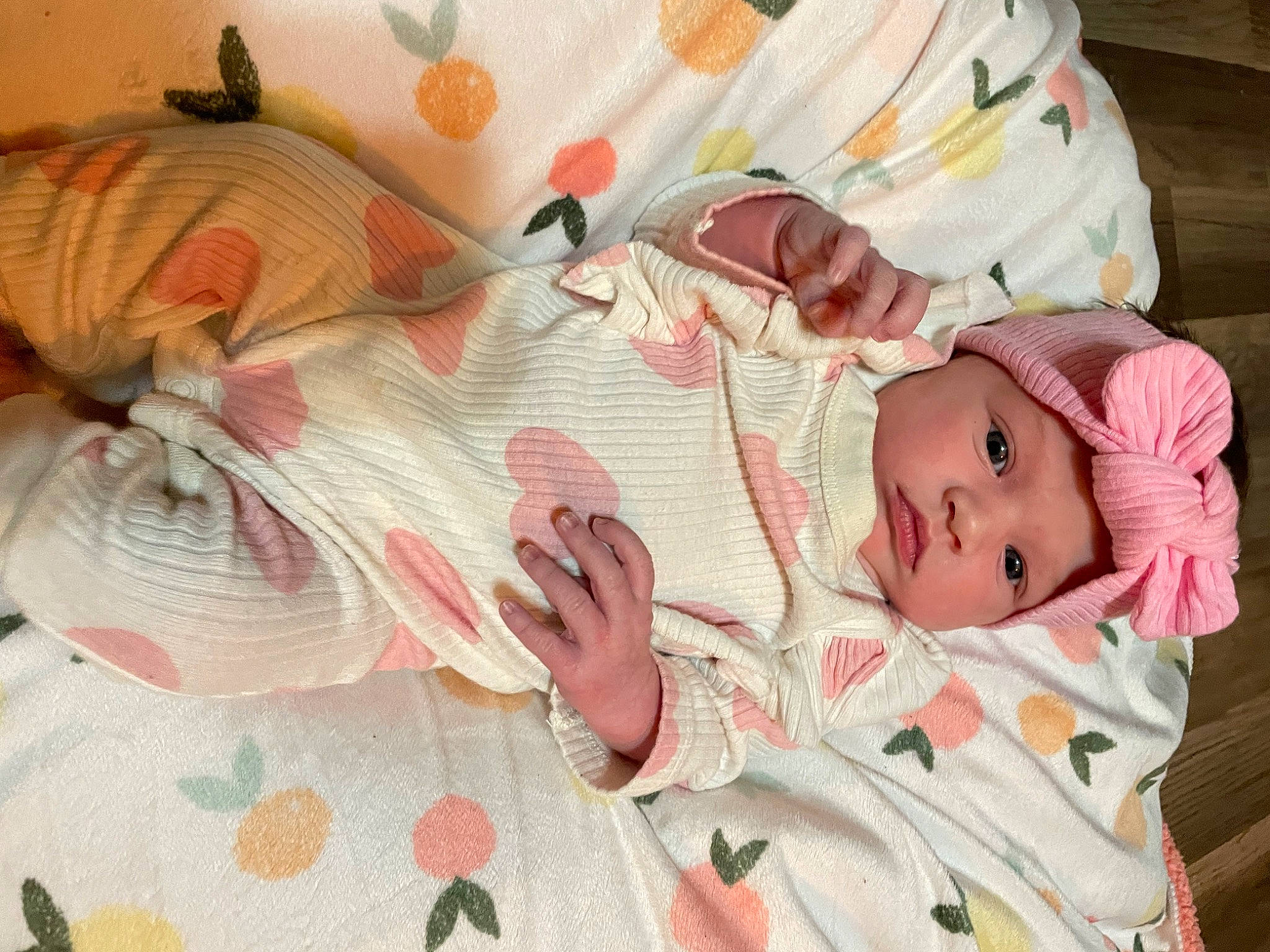 Ellie is registered to the contest to win money with this photo: baby, baby_products, baby_sleeping, baby_toddler_clothing, bedding, bedtime, child, comfort, eye, headwear, linens, pattern, peach, person, pink, room, skin, sleep, sleeve, textile