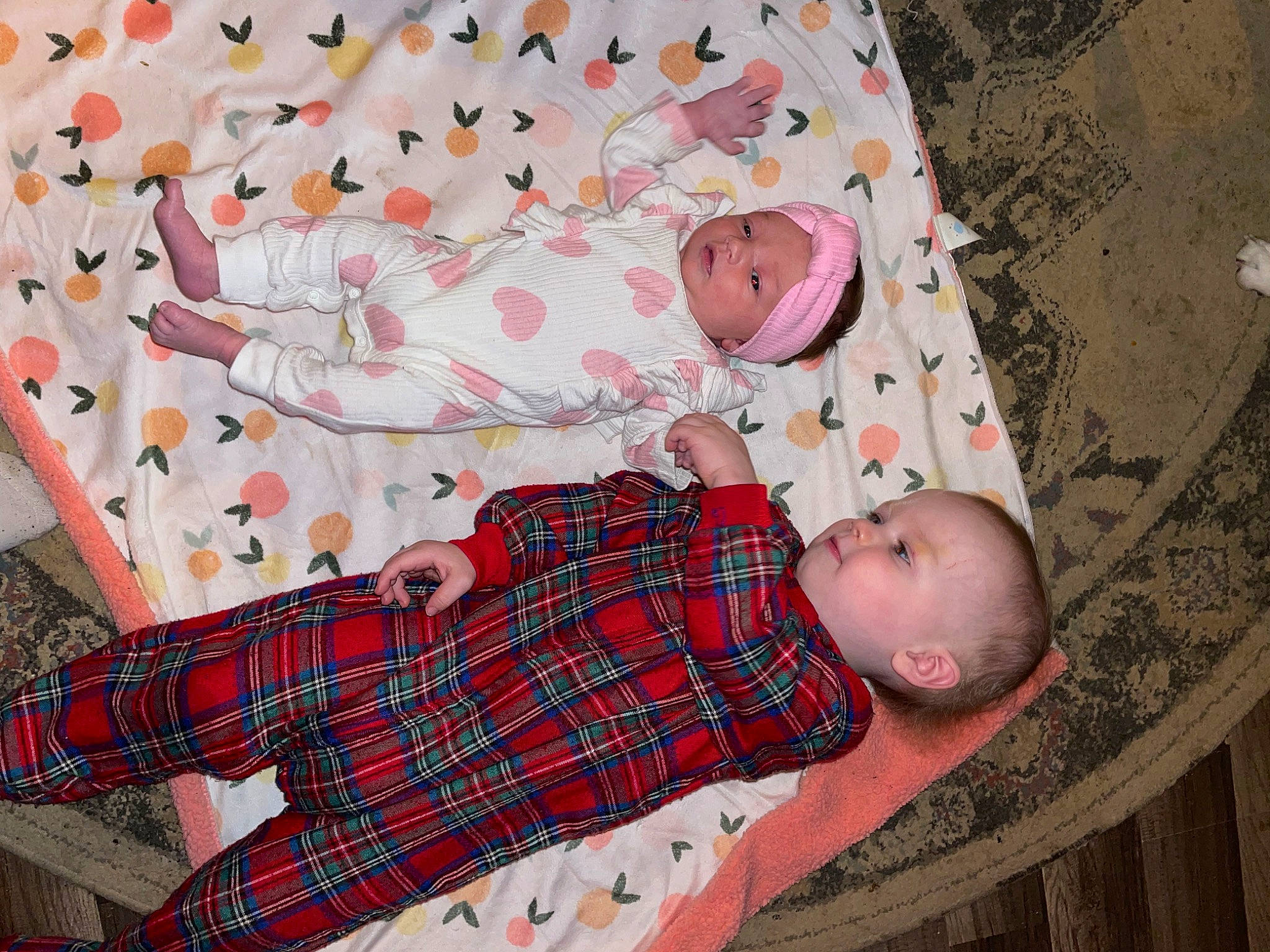 Axel is registered to the contest to win money with this photo: baby, baby_products, baby_toddler_clothing, child, comfort, design, headwear, linens, mammal, pattern, person, plaid, product, red, room, sleeve, sock, tartan, textile, toddler