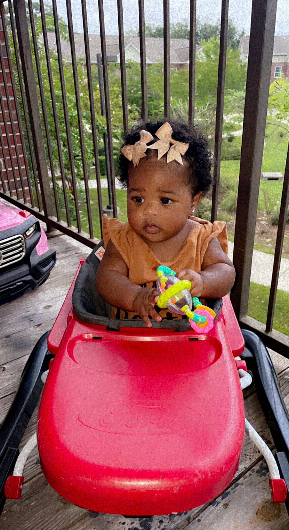 Mahlani joined the competition — help win amazing prizes! automotive_lighting, baby, baby_toddler_clothing, car, child, dress, face, fence, fun, grass, happy, leisure, people, person, pink, plant, recreation, summer, toddler, vehicle