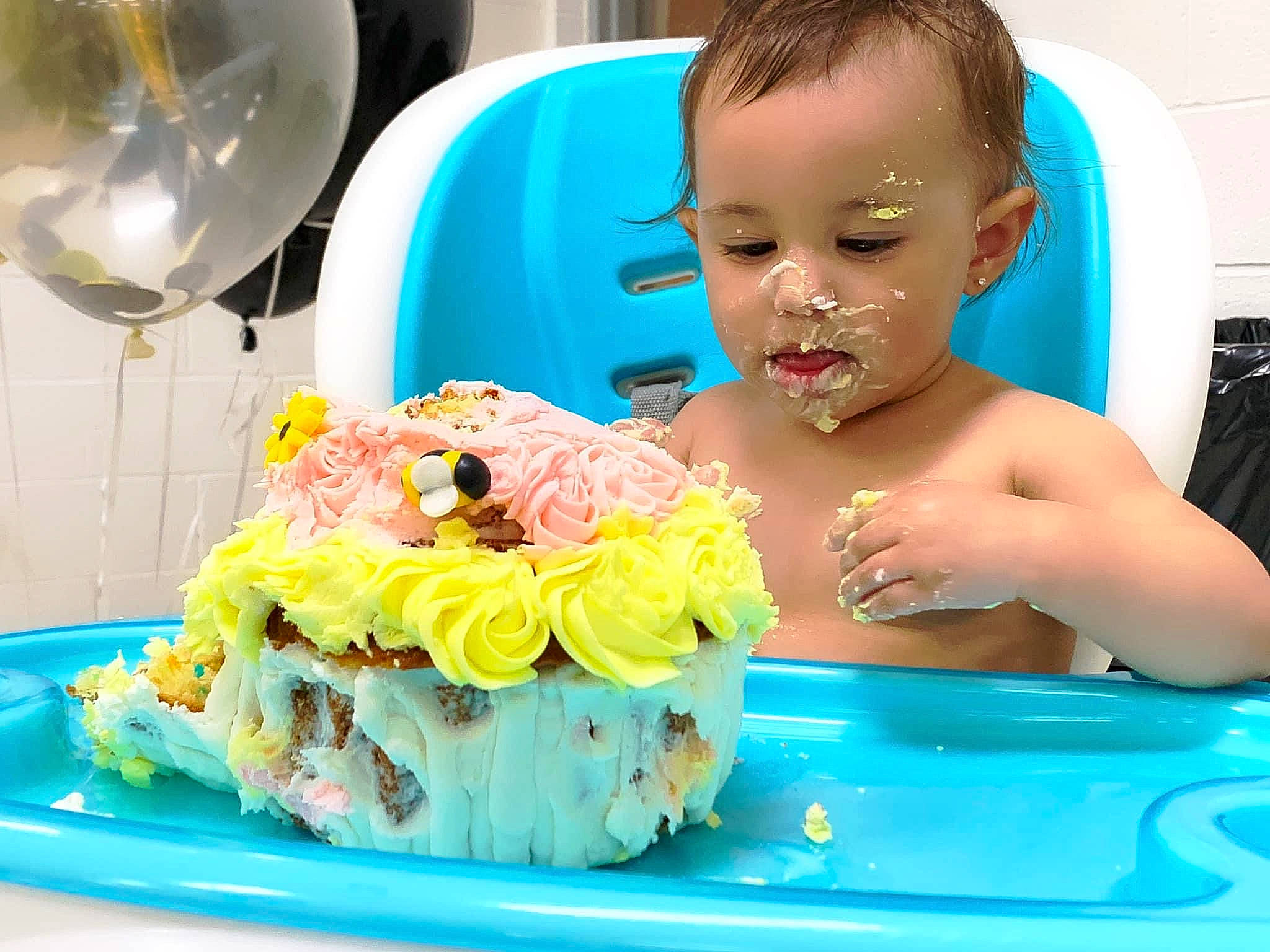 Elizah is registered to the contest to win money with this photo: aqua, baby, baby_bathing, balloon, bathing, birthday_cake, blue, cake, cake_decorating, cake_decorating_supply, flower, food, happy, ingredient, person, plant, plate, recipe, sugar_cake, tableware