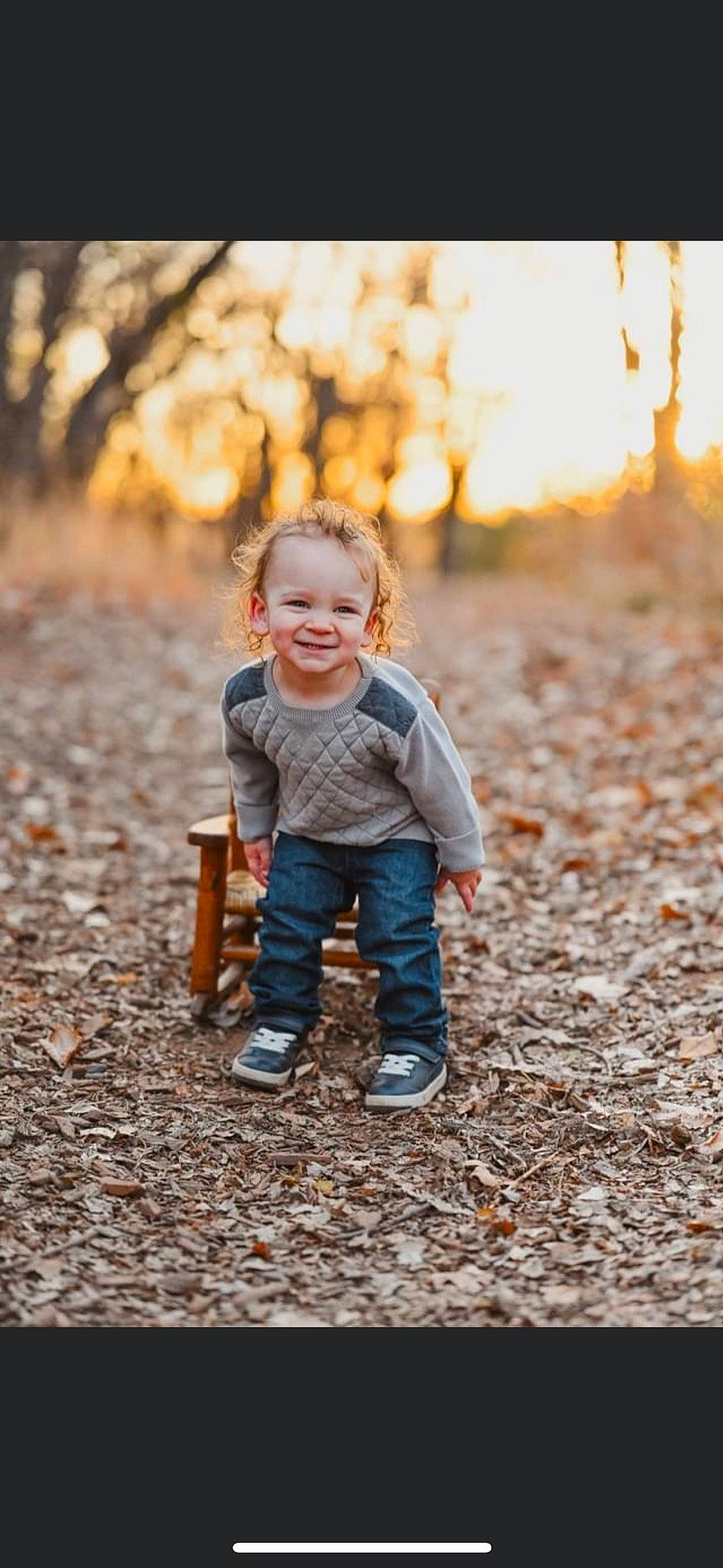 Killian is registered to the contest to win money with this photo: branch, clothing, dress, eye, face, flash_photography, hair, happy, head, human_body, jeans, joy, leaf, leg, orange, people_in_nature, person, plant, smile, tree