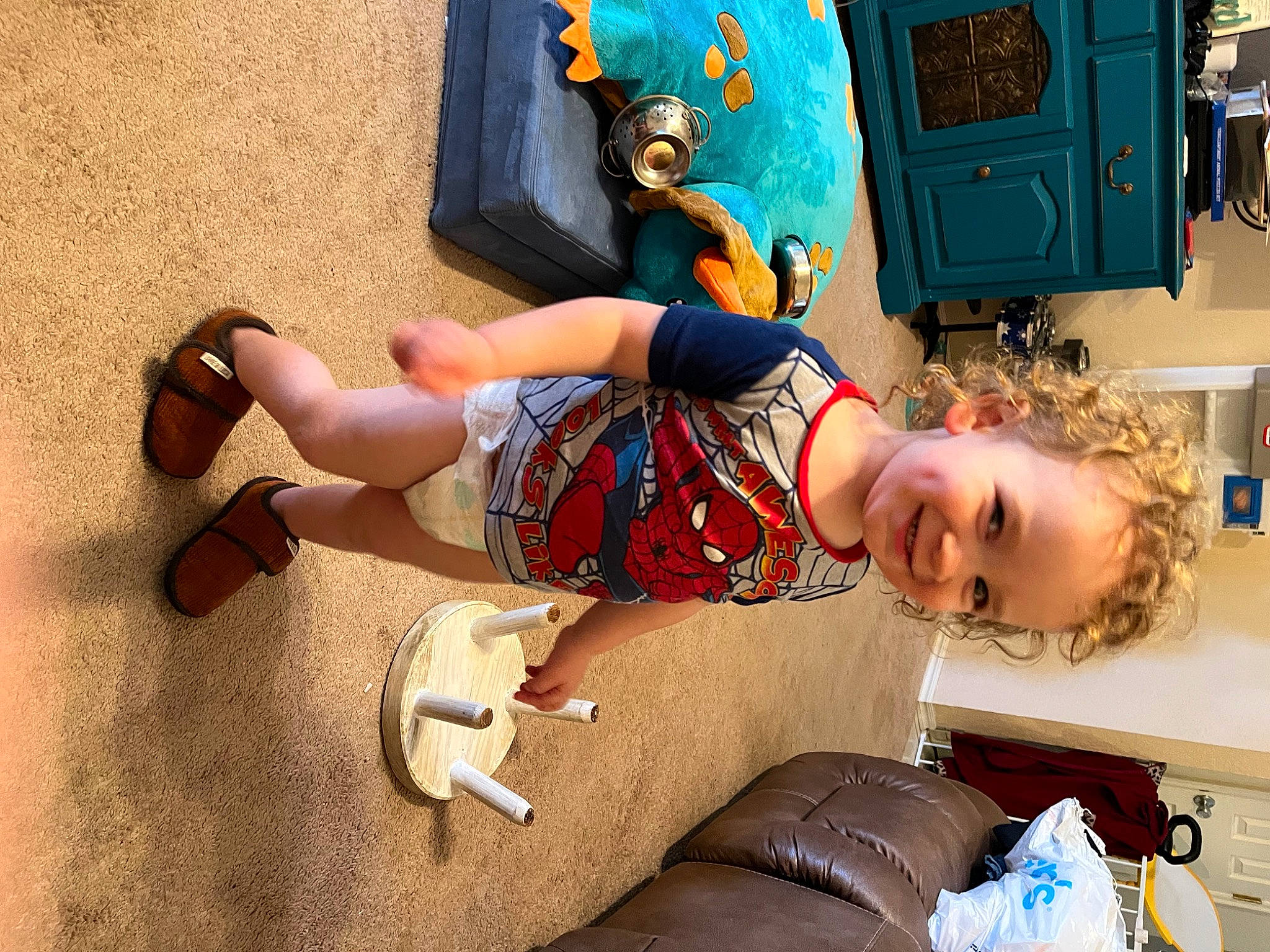 Killian joined the competition — help win amazing prizes! abdomen, bag, child, comfort, couch, eyewear, foot, fun, happy, human_leg, joy, knee, leg, leisure, luggage_and_bags, person, room, sitting, smile, sunglasses