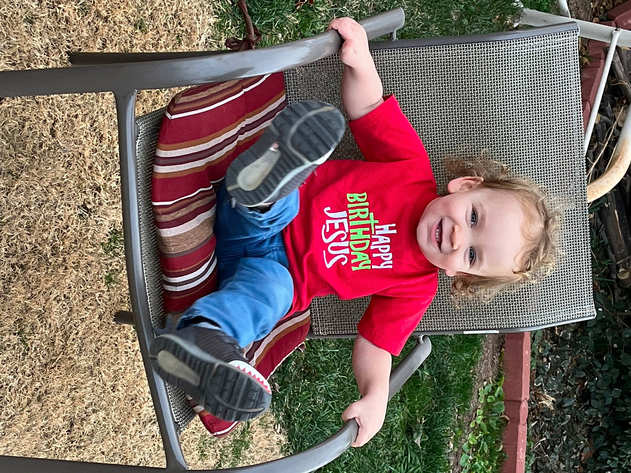 Killian joined the competition — help win amazing prizes! baby, baby_toddler_clothing, chair, child, comfort, cool, fun, grass, happy, joy, leisure, outdoor_furniture, outdoor_play_equipment, person, play, recreation, shorts, sitting, smile, t_shirt