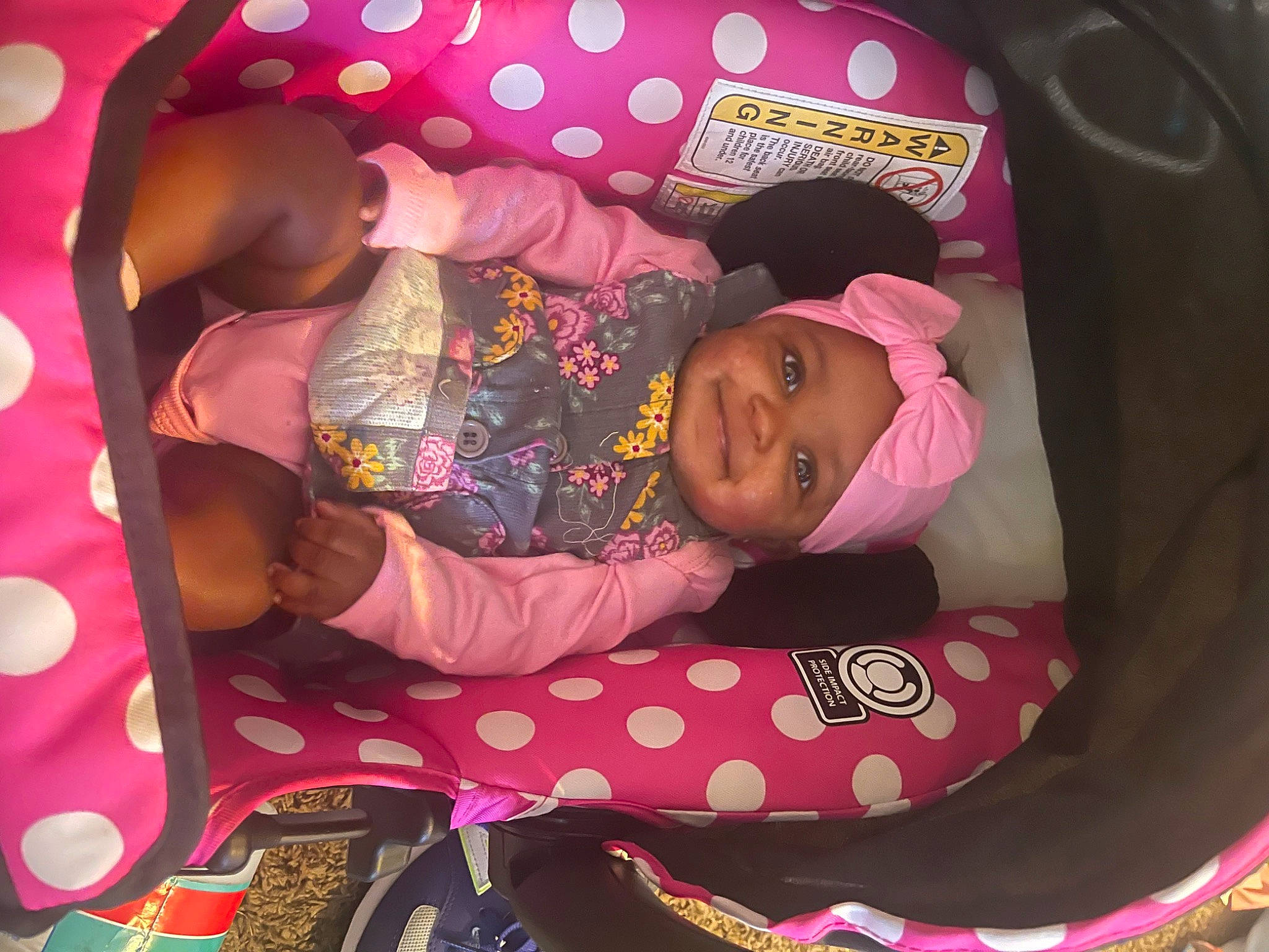 Kara joined the competition — help win amazing prizes! baby, baby_carriage, baby_products, baby_toddler_clothing, cap, child, comfort, fashion_accessory, fun, happy, headwear, joy, linens, magenta, pattern, person, pink, play, product, purple