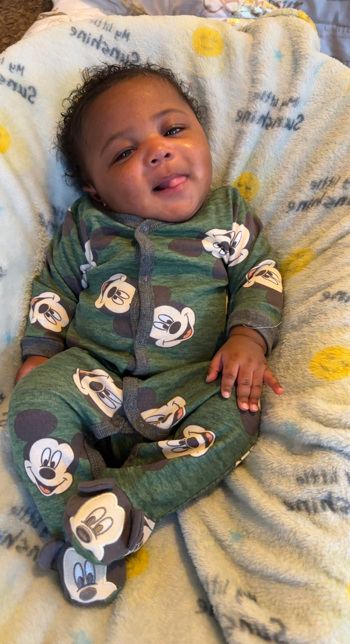 Koda joined the competition — help win amazing prizes! arm, baby, baby_toddler_clothing, cheek, child, comfort, eye, face, gesture, hair, happy, head, linens, person, sitting, skin, sleeve, smile, textile, thumb