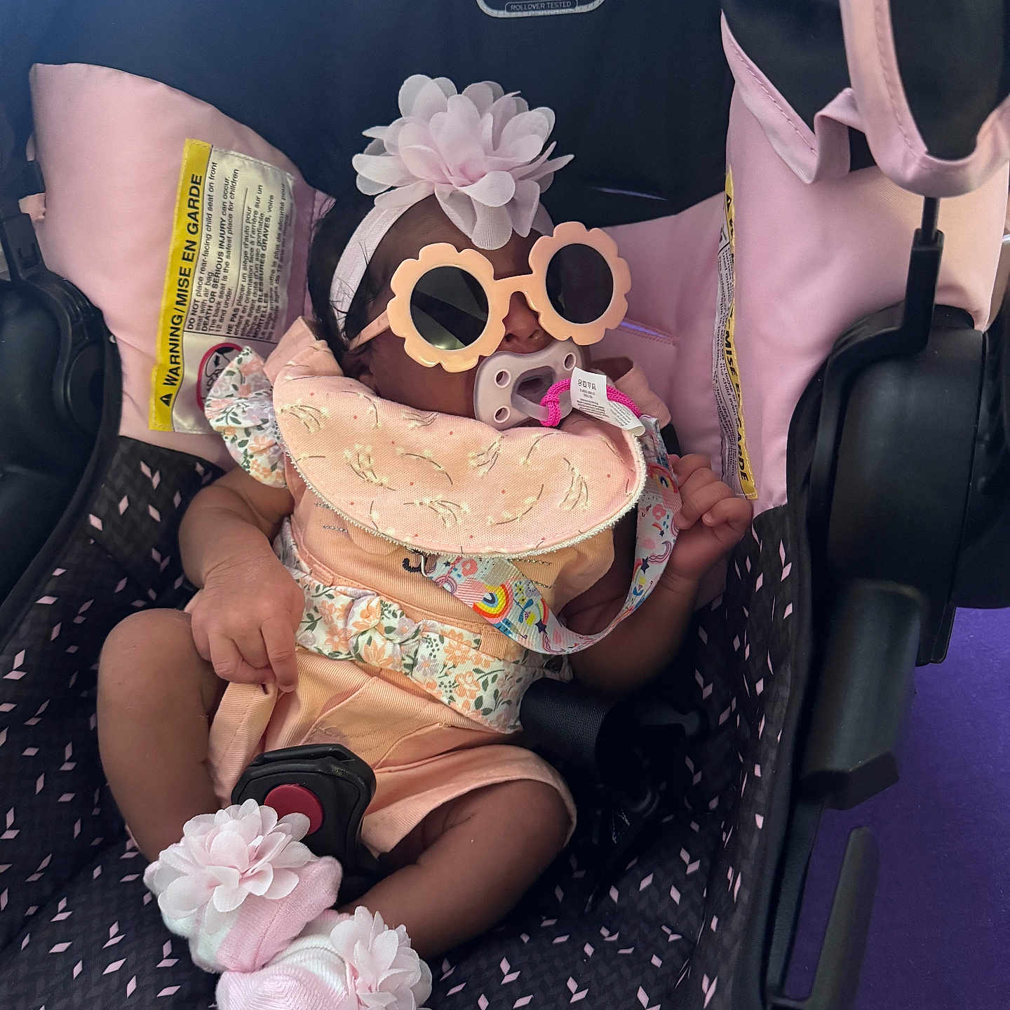 Kori joined the competition — help win amazing prizes! baby, infant, stroller, evenflo, pacifier, sunglasses, headband, flower, bib, sock, pink, black, clothing, baby_accessory, cute, child, person, seat, car_seat, relaxing