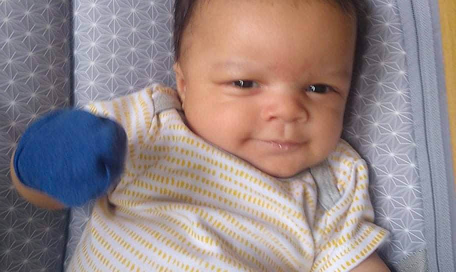 Haiden is registered to the contest to win money with this photo: baby, baby_toddler_clothing, cheek, child, chin, collar, comfort, eyebrow, eyelash, happy, iris, mouth, nose, pattern, person, product, sitting, skin, sleeve, smile