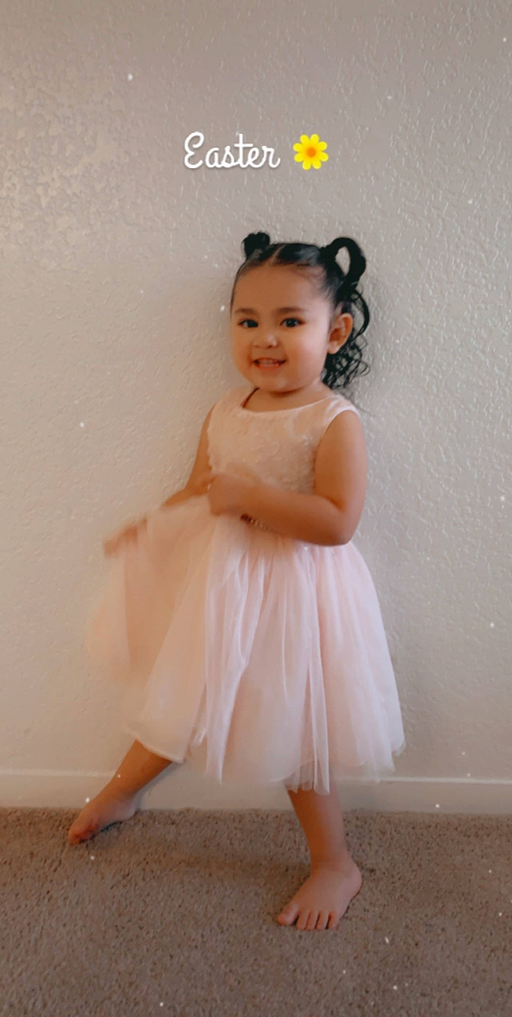 Angela is registered to the contest to win money with this photo: baby_toddler_clothing, cheek, child, child_model, clothing, day_dress, dress, embellishment, fashion_accessory, fawn, foot, hair_accessory, headgear, headpiece, joy, one_piece_garment, peach, person, pink, skin