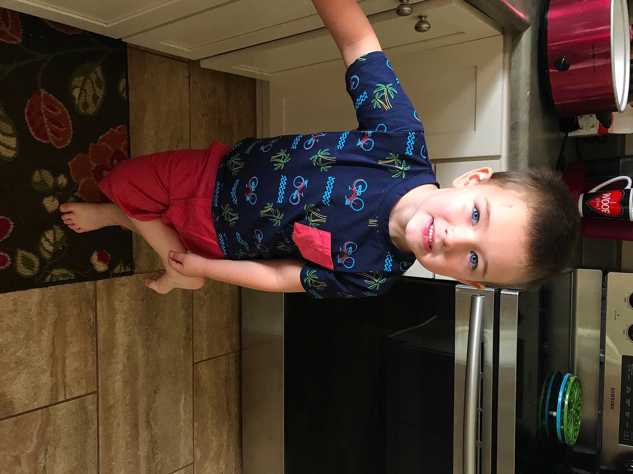 Coleman is registered to the contest to win money with this photo: automotive_exterior, child, door, electric_blue, family_car, fun, happy, hat, magenta, pattern, person, room, smile, t_shirt, thigh, toddler, vehicle_door