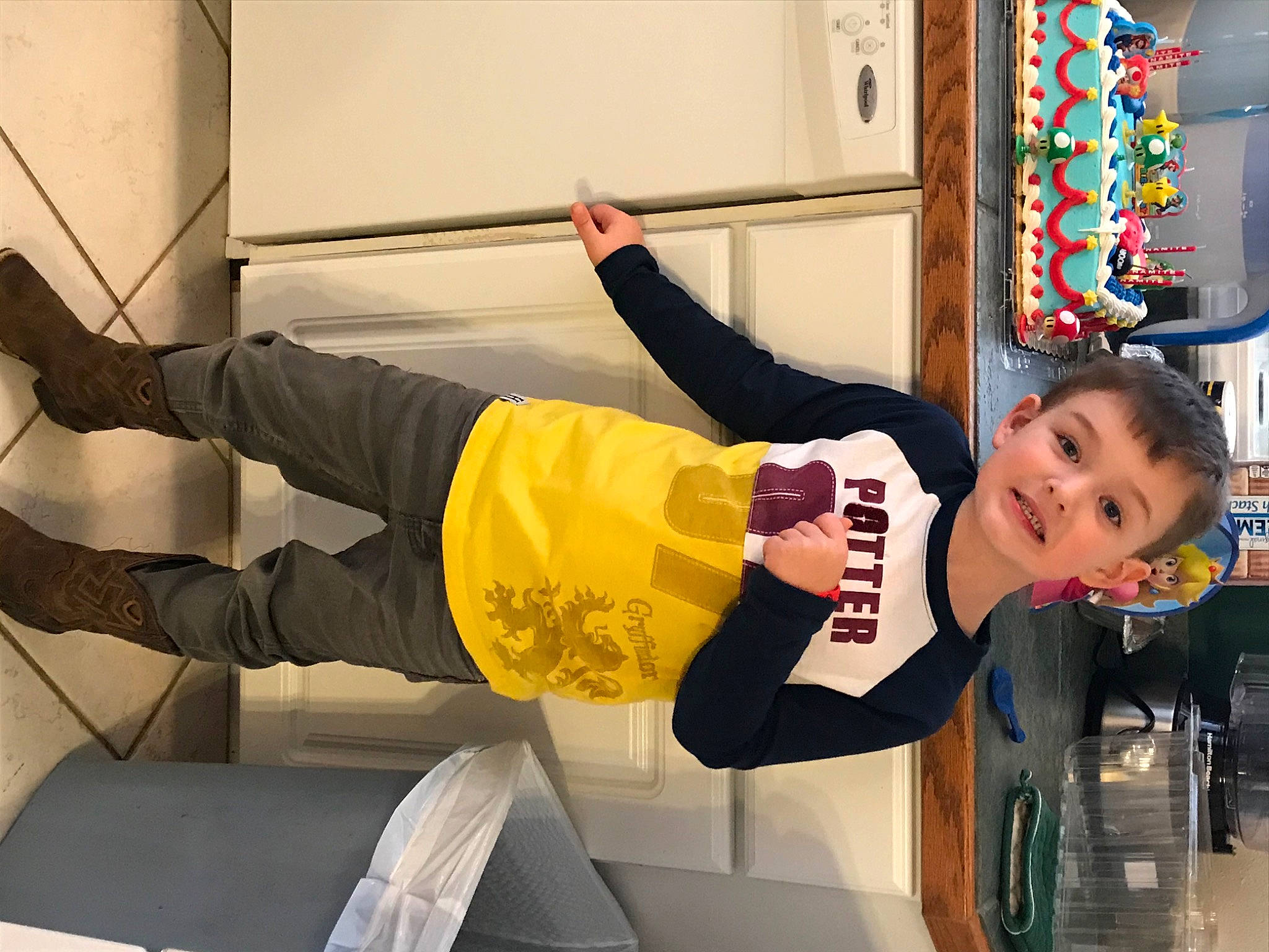 Coleman is registered to the contest to win money with this photo: active_pants, arm, balance, comfort, elbow, fun, happy, human_leg, knee, leg, person, physical_fitness, room, sitting, sleeve, sportswear, standing, t_shirt, thigh, toddler