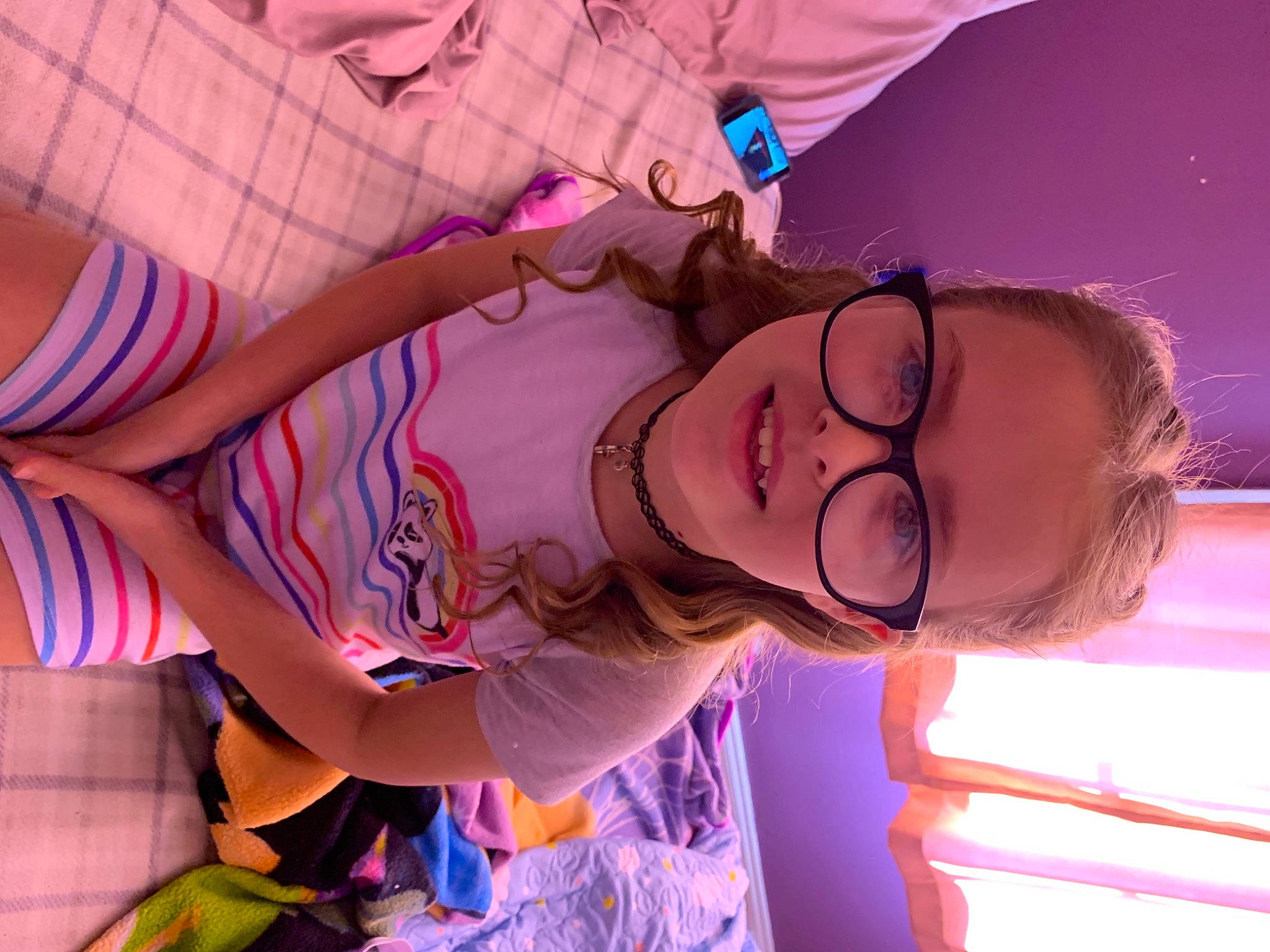 Lyla joined the competition — help win amazing prizes! child, event, eyewear, facial_expression, fun, glasses, happy, joy, leisure, magenta, mouth, pattern, person, pink, purple, room, skin, smile, summer, thigh