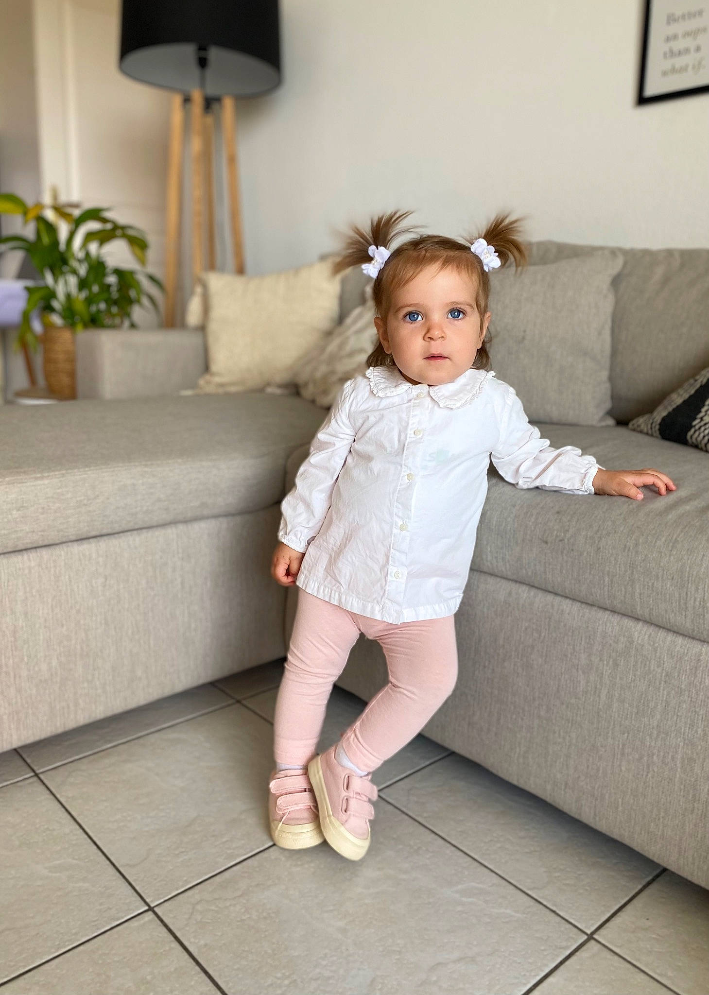 Joyce participe au concours pour gagner de l'argent avec cette photo : arm, baby_toddler_clothing, barefoot, comfort, couch, dress, floor, flooring, hardwood, head, houseplant, knee, living_room, person, picture_frame, plant, skin, sleeve, thigh, toddler