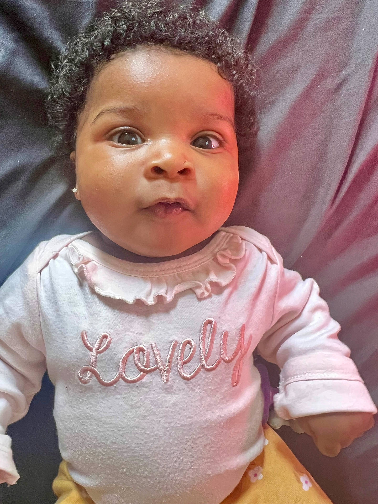 Halo is registered to the contest to win money with this photo: baby, babylaughing, blackhair, clothing, curlyhair, face, hair, happy, head, mohawkhairstyle, person, photography, portrait, sleeve, smile