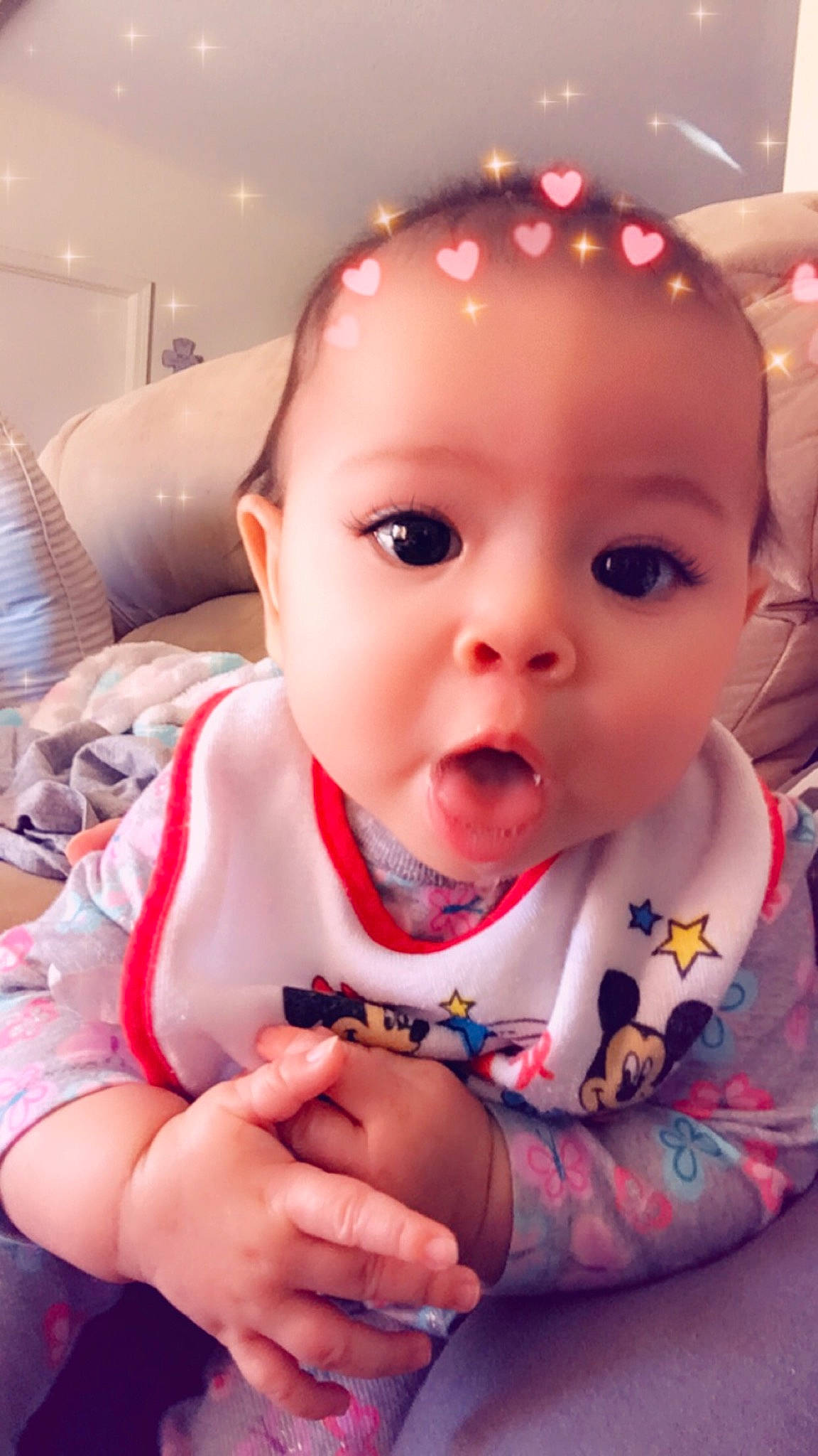 Erynn joined the competition — help win amazing prizes! baby, cheek, child, face, finger, head, lip, mouth, nose, person, pink, skin, smile, surprise, toddler