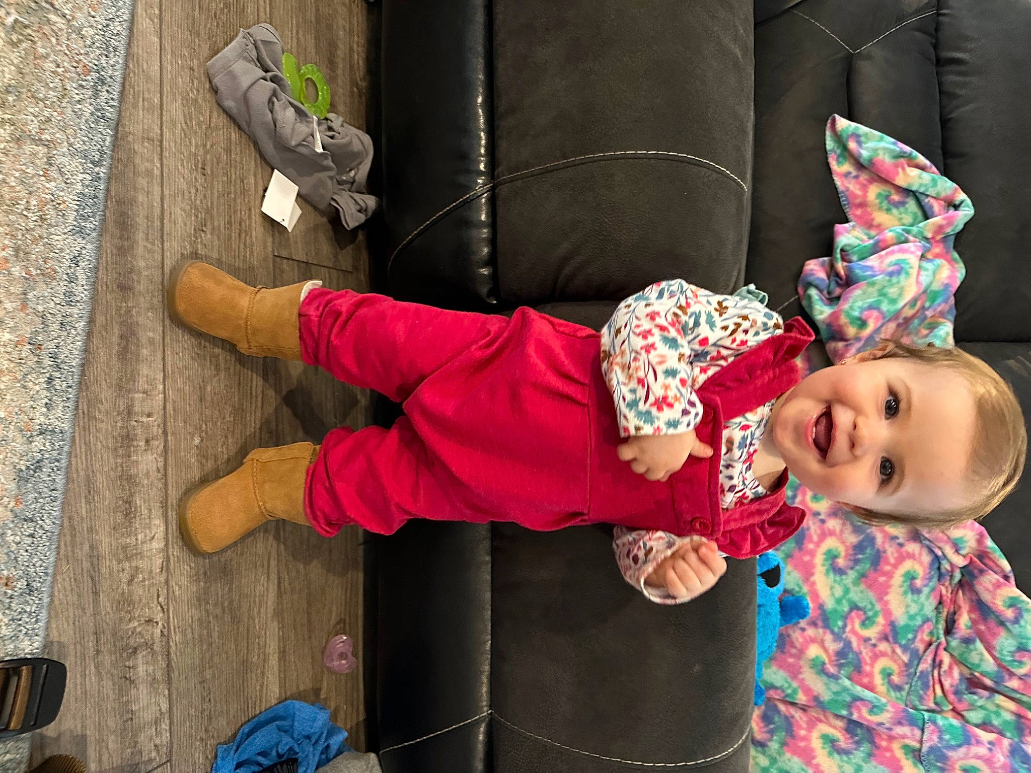 Maeve is registered to the contest to win money with this photo: baby, baby_toddler_clothing, child, fun, happy, hat, human_leg, joy, leg, leisure, magenta, pattern, person, pink, sitting, smile, snapshot, textile, thigh, toddler