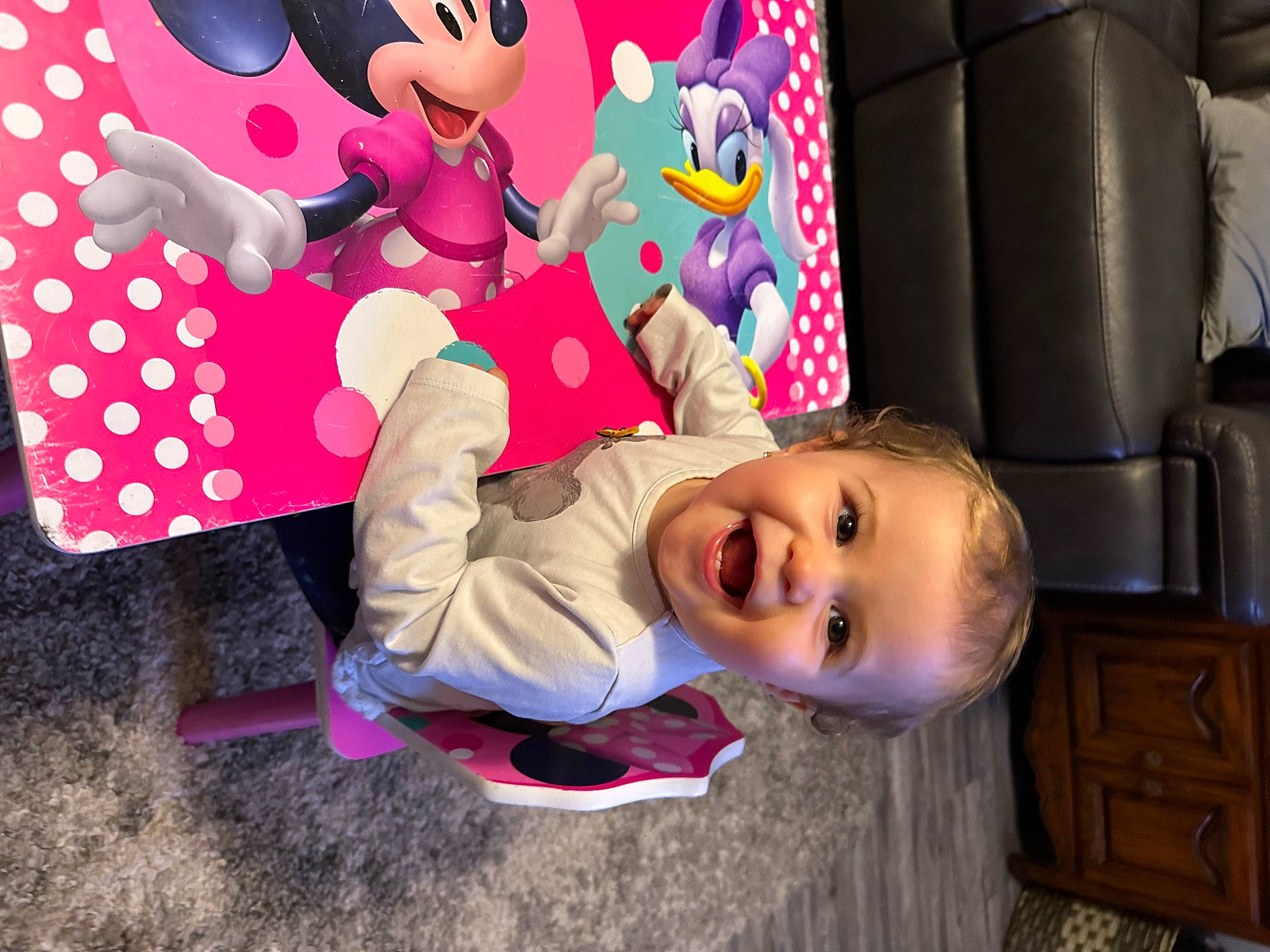 Maeve is registered to the contest to win money with this photo: art, baby, baby_laughing, baby_toddler_clothing, carmine, child, fun, happy, joy, leisure, magenta, party_supply, person, pink, play, product, purple, recreation, room, smile