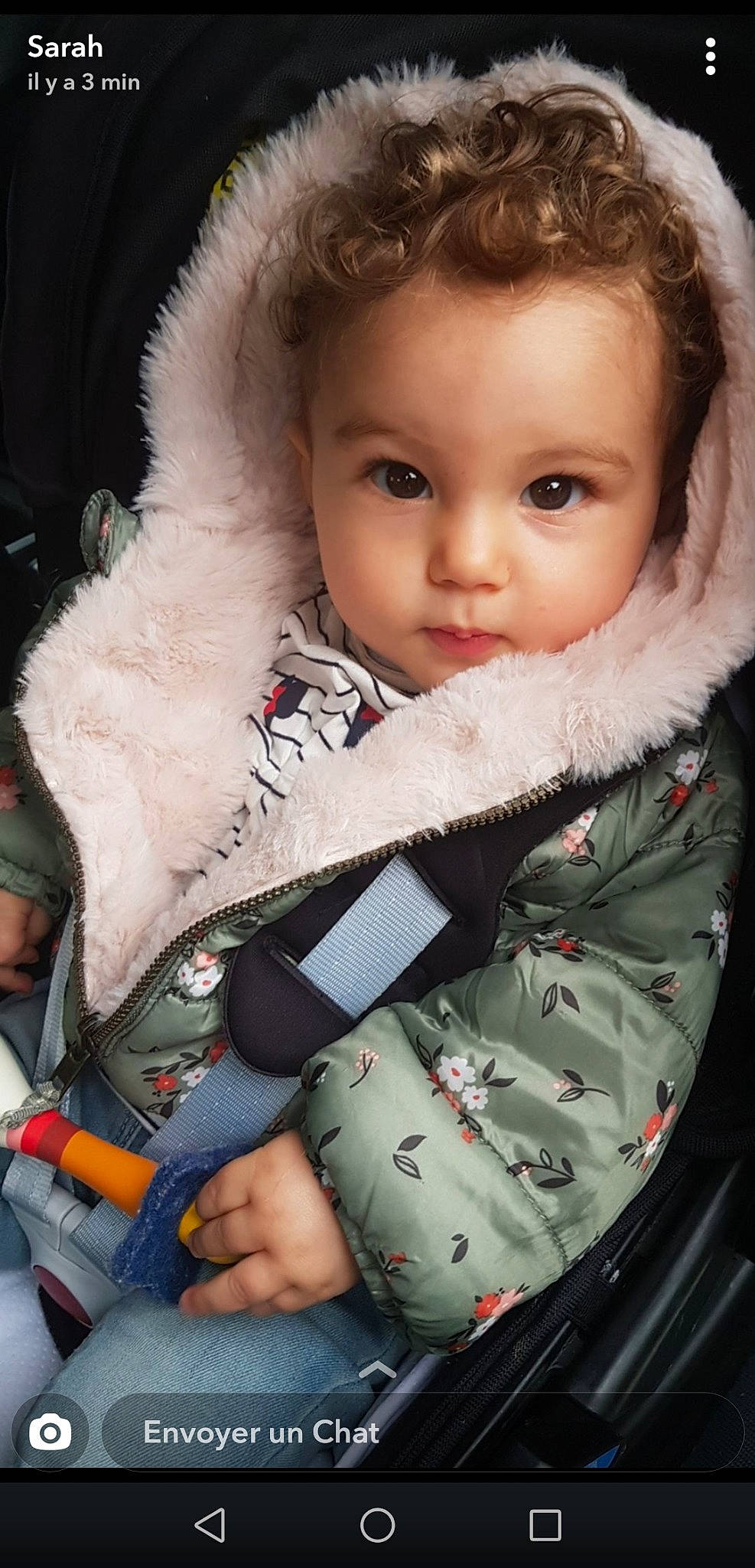 Aurore a rejoint le concours — aidez-le/la à gagner de superbes lots ! baby, baby_carriage, baby_in_car_seat, baby_products, car_seat, cheek, child, fur, fur_clothing, head, iris, parka, person, product, skin, toddler