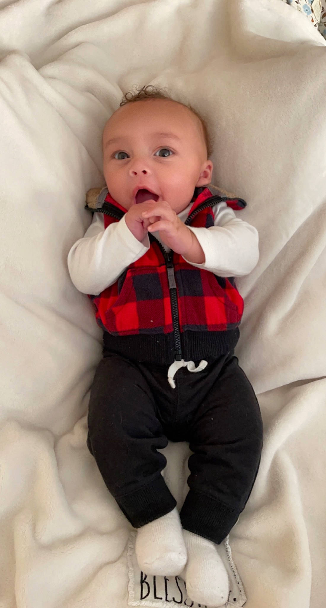 Kailer joined the competition — help win amazing prizes! baby, baby_toddler_clothing, chin, collar, comfort, dress_shirt, eye, face, formal_wear, gesture, hair, head, leg, nose, person, plaid, sleeve, tartan, textile, tie