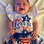 baby, child, smiling, celebration, fourth_of_july, clothing, dress, headband, bow, white_blanket, happy, infant, cute, patriotic, stars, stripes, red_white_blue, portrait, laying_down, holiday
