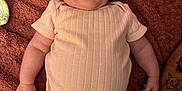 Brileigh is registered to the contest to win money with this photo: baby, infant, smiling, onesie, blanket, lying_down, happy, child, human, skin, arm, tattoo, cute, face, person, indoors, soft, comfortable, newborn, pink
