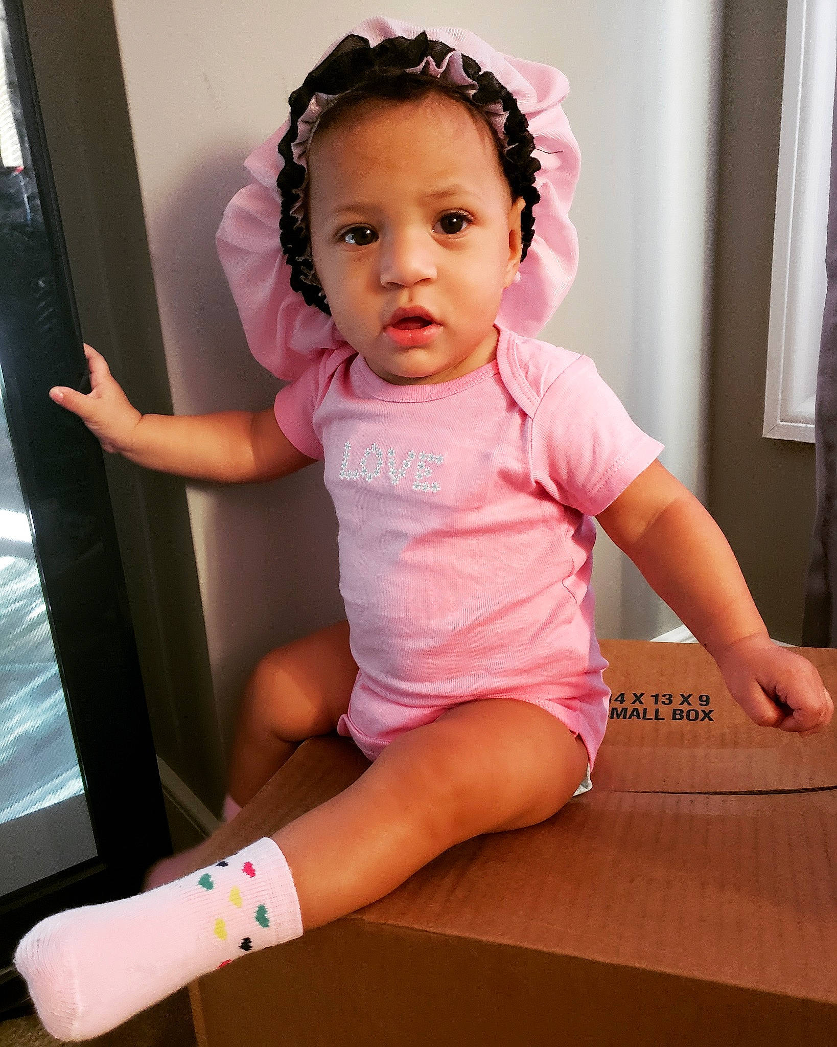 A'Miracle is registered to the contest to win money with this photo: arm, cheek, child, child_model, girl, hair_accessory, hand, infant, joint, leg, person, pink, product, shoulder, sitting, toddler