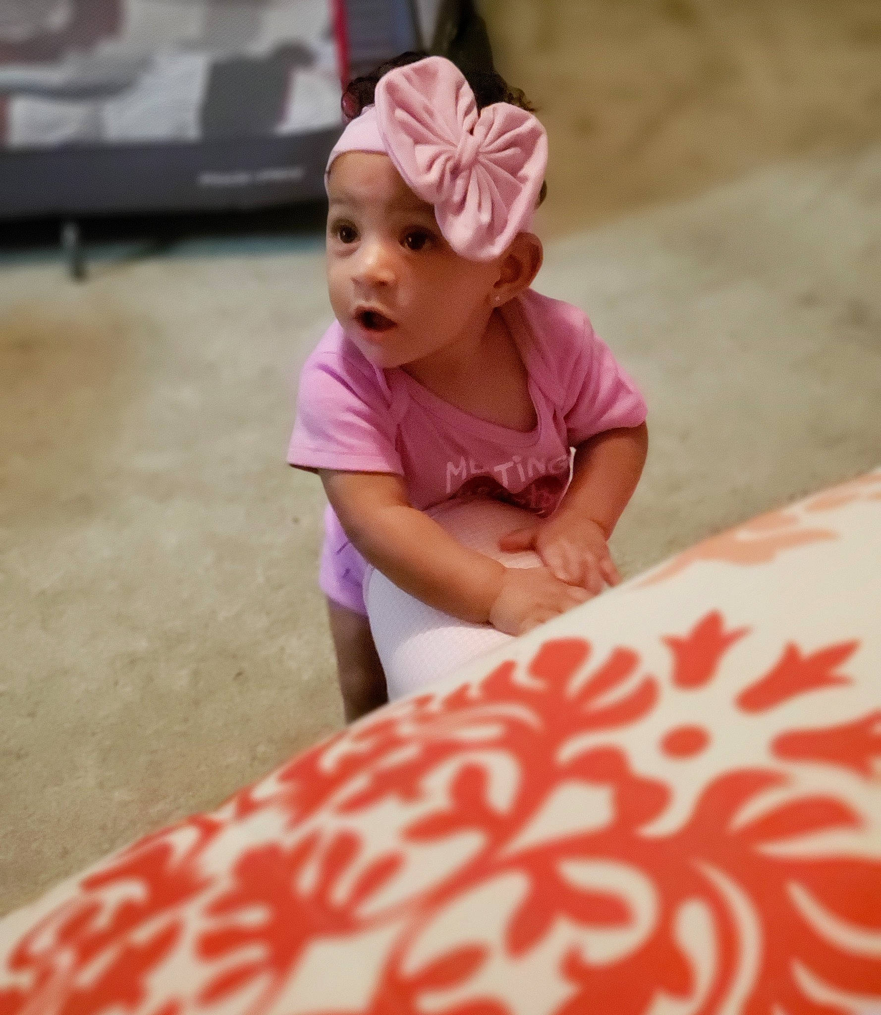 A'Miracle is registered to the contest to win money with this photo: child, day, girl, hair_accessory, headband, headgear, infant, material, person, pink, play, product, skin, surprise, textile, toddler