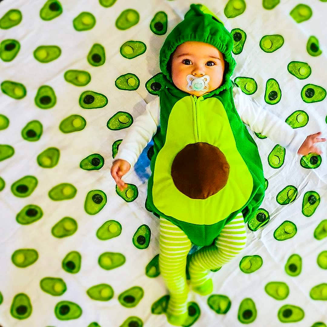 Beckham is registered to the contest to win money with this photo: baby_toddler_clothing, cartoon, child, design, green, illustration, pattern, person, textile
