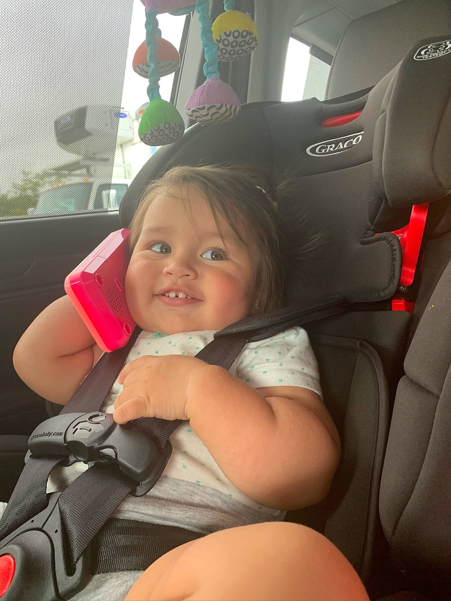 Allyson is registered to the contest to win money with this photo: auto_part, automotive_design, automotive_exterior, car_seat, car_seat_cover, comfort, family_car, fun, happy, leg, motor_vehicle, person, smile, steering_part, steering_wheel, thigh, thumb, toddler, vehicle, vehicle_door