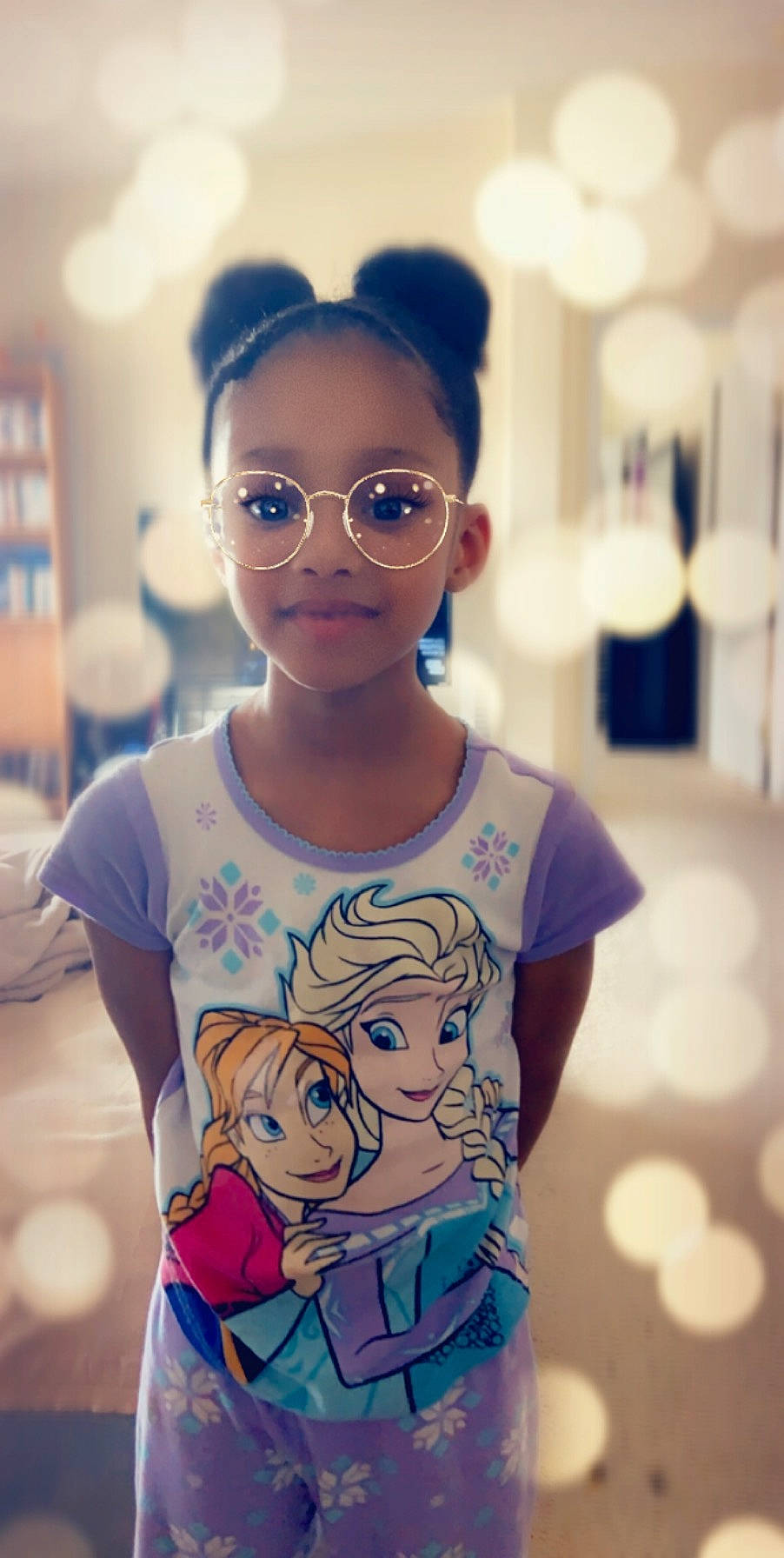 Aria is registered to the contest to win money with this photo: arm, blue, child, cool, eyewear, face, fictional_character, fun, glasses, happy, head, person, shoulder, skin, smile, style, t_shirt, toddler, top, vacation