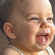 Deva participe au concours pour gagner de l'argent avec cette photo : baby, child, smiling, happy, portrait, face, skin, eyes, mouth, teeth, tank_top, infant, cute, joy, expression, closeup, head, shoulders, young, background