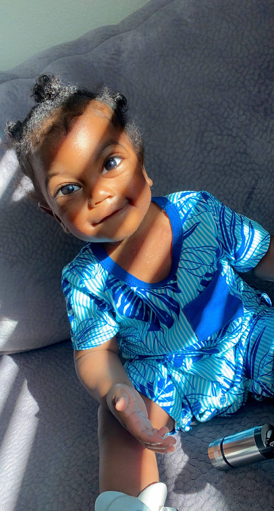 Jovãni is registered to the contest to win money with this photo: black_hair, child, cool, day_dress, electric_blue, eyelash, fashion_design, flash_photography, formal_wear, fun, hairstyle, human_leg, jewellery, lip, long_hair, pattern, person, sitting, thigh, trunk