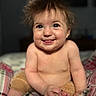 Airika is registered to the contest to win money with this photo: baby, child, smile, happy, hair, face, skin, eyes, tongue, sitting, blanket, pattern, indoor, portrait, cute, infant, expression, person, cozy, soft
