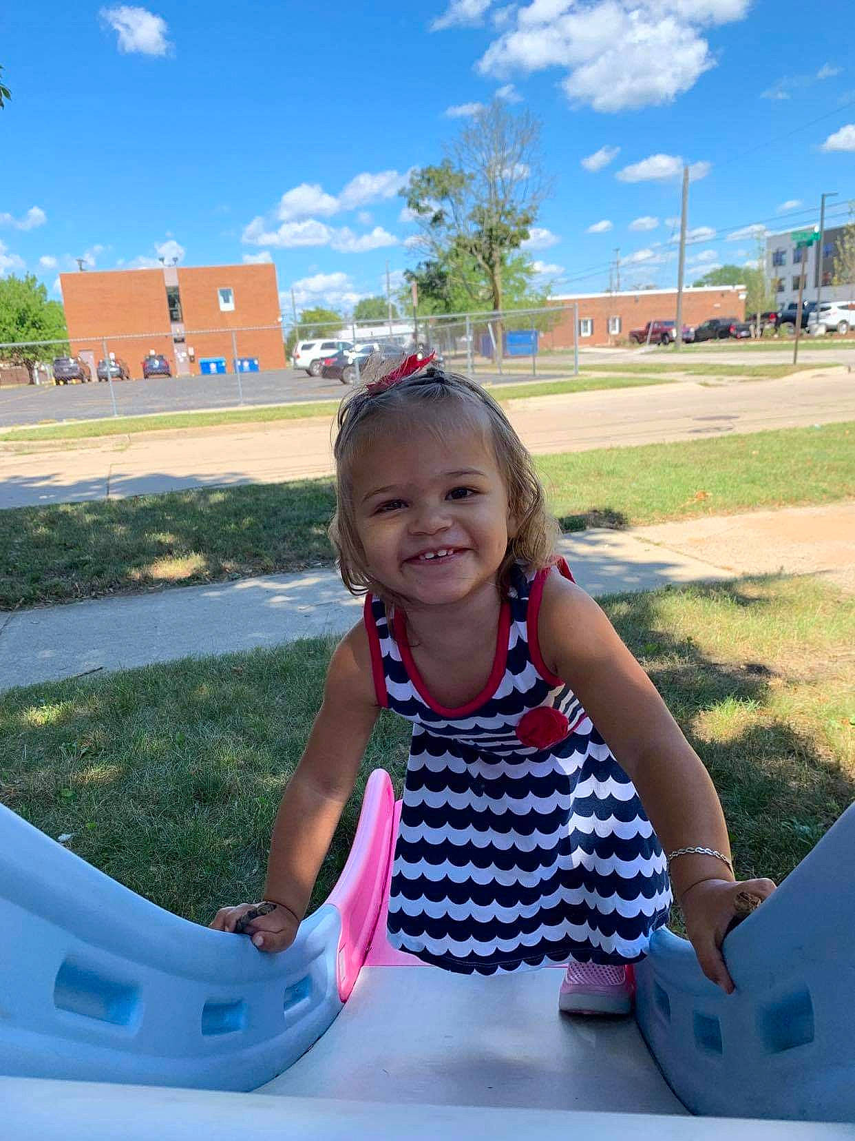 Jessa joined the competition — help win amazing prizes! asphalt, automotive_exterior, automotive_tire, bumper, cloud, fun, grass, happy, joy, leisure, motor_vehicle, person, plant, recreation, sky, smile, summer, t_shirt, toddler, travel