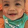 Yamin is registered to the contest to win money with this photo: baby, child, closeup, cute, eyes, face, green_shirt, hand, happy, head, holding_hand, indoors, infant, mouth, person, portrait, red_marks, skin_mark, sleeveless_shirt, smiling