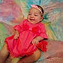 Ava is registered to the contest to win money with this photo: baby, infant, pink_dress, headband, smile, happy, cute, child, soft_blanket, pastel_colors, lying_down, indoors, portrait, adorable, skin, baby_girl, toddler, cozy, comfort, fashion