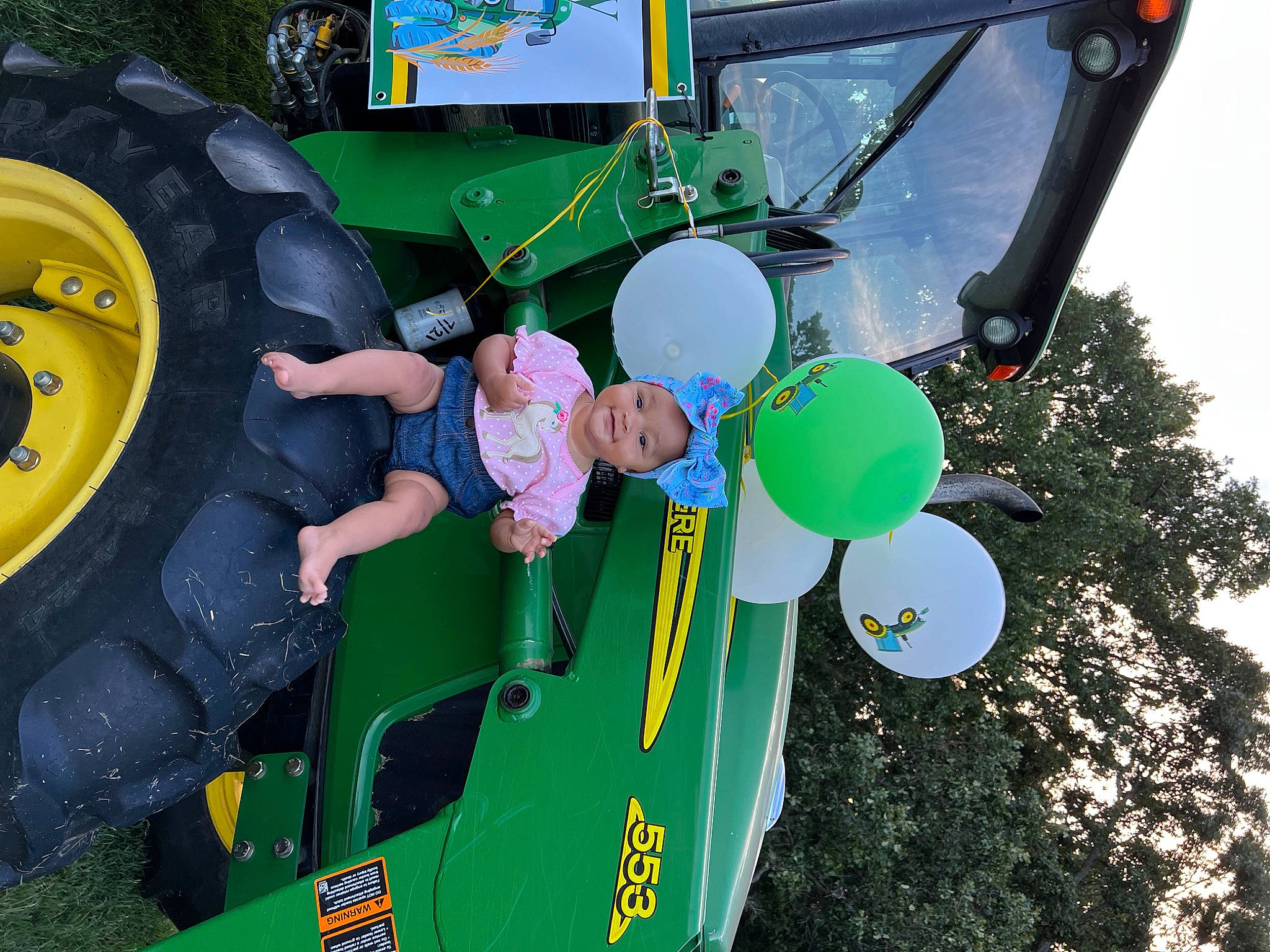 Diamond joined the competition — help win amazing prizes! automotive_exterior, automotive_tire, automotive_wheel_system, fender, fun, green, headwear, joy, leisure, motor_vehicle, person, playground, recreation, sky, synthetic_rubber, tire, toddler, tractor, tread, tree