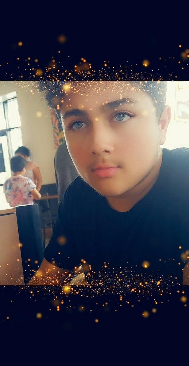 Brandon is registered to the contest to win money with this photo: beauty, cap, chin, cool, darkness, electric_blue, event, eyelash, flash_photography, fun, happy, human, lens_flare, light, lighting, lip, midnight, person, photograph, space