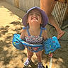 Blakelyn is registered to the contest to win money with this photo: accessories, adult, baby, bag, clothing, dress, face, female, footwear, handbag, hat, head, person, photography, portrait, shoe, shorts, summer, sunhat, woman
