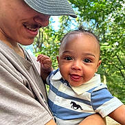 Zenith joined the competition — help win amazing prizes! baby, child, person, smile, tongue_out, cap, short_sleeve, striped_shirt, horse_logo, outdoor, nature, greenery, arm, holding, happy, portrait, close_up, daylight, casual, affection