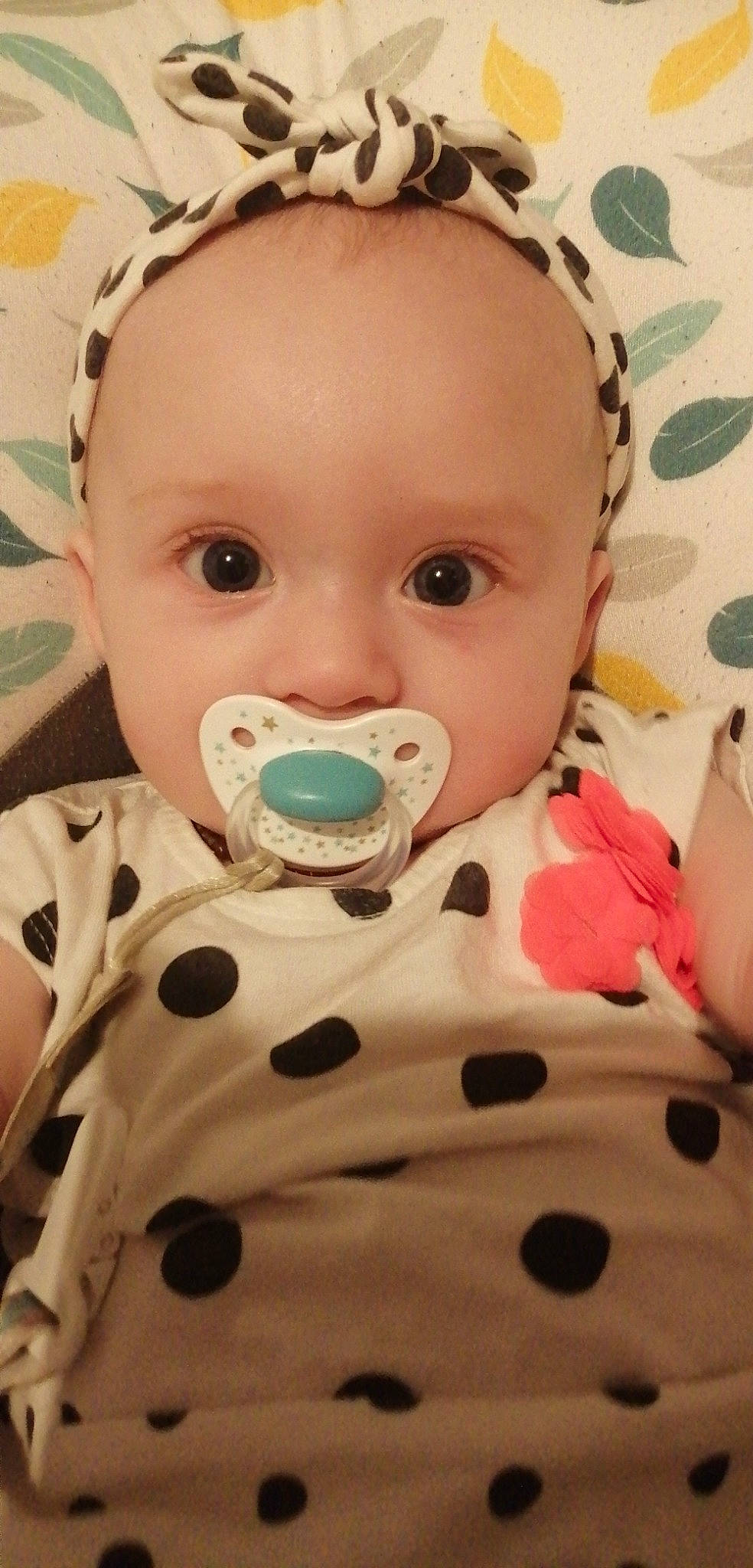 Séréna a rejoint le concours — aidez-le/la à gagner de superbes lots ! baby, baby_toddler_clothing, cheek, child, dress, eye, eyelash, head, human_body, iris, lip, nose, organ, pattern, person, pink, skin, sleeve, textile, toddler