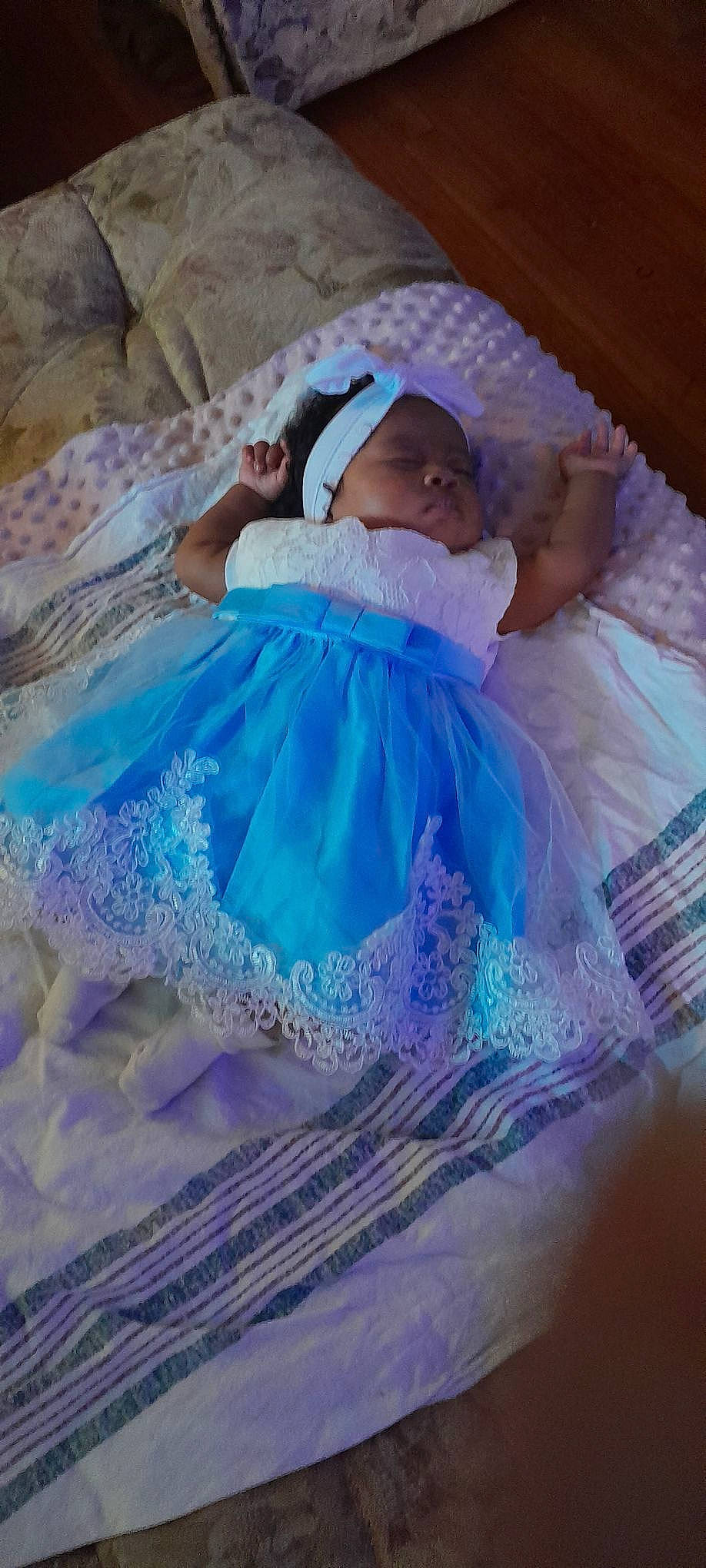 Wynter is registered to the contest to win money with this photo: baby, baby_products, baby_toddler_clothing, bridal_accessory, cocktail_dress, day_dress, dress, electric_blue, embellishment, event, fashion_accessory, fashion_design, hair_accessory, happy, iris, linens, pattern, peach, person, ruffle