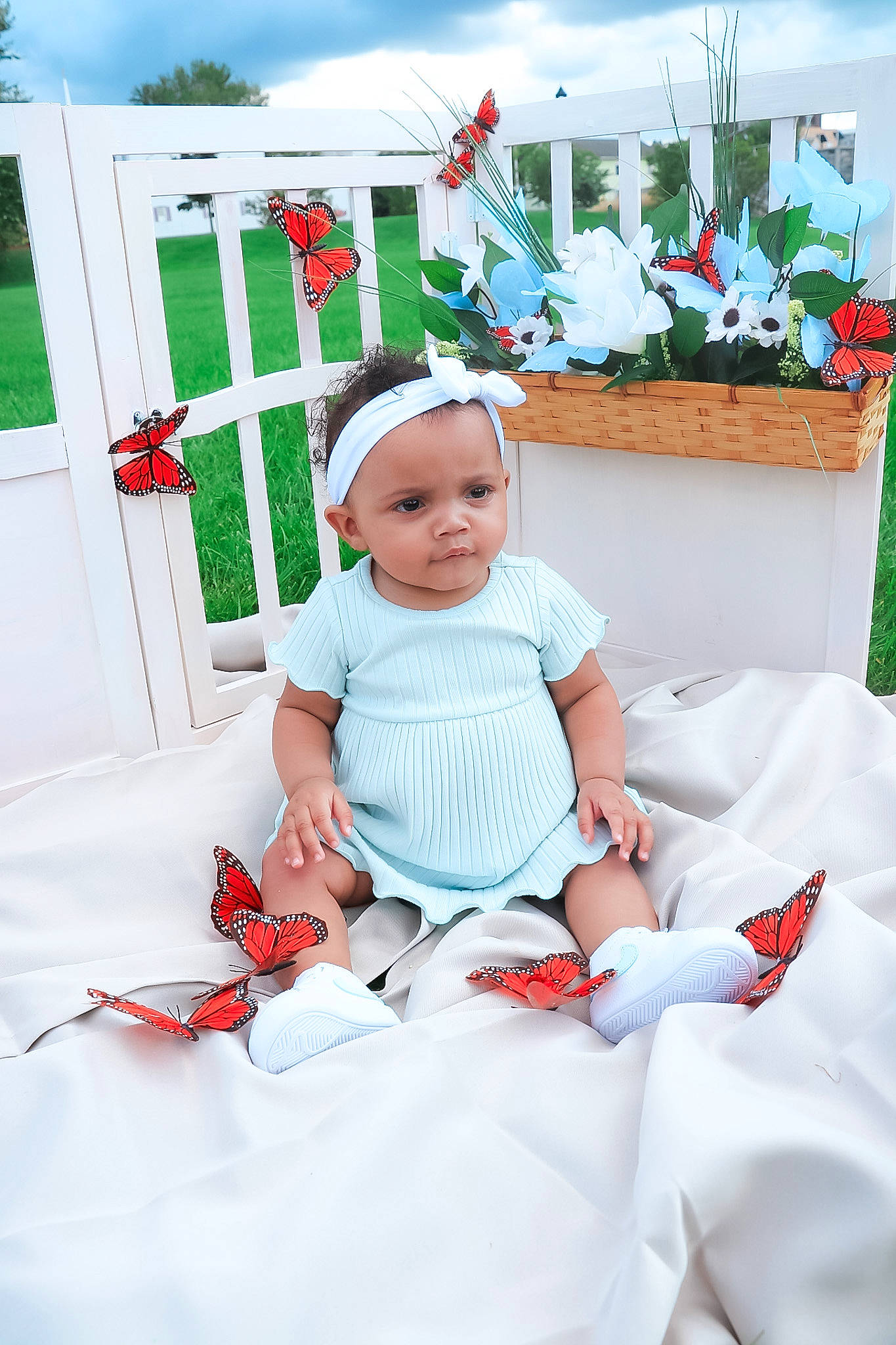 Vera is registered to the contest to win money with this photo: baby, baby_toddler_clothing, carmine, child, cloud, event, fun, grass, happy, hat, headwear, holiday, lap, leisure, people, person, plant, recreation, sitting, sky