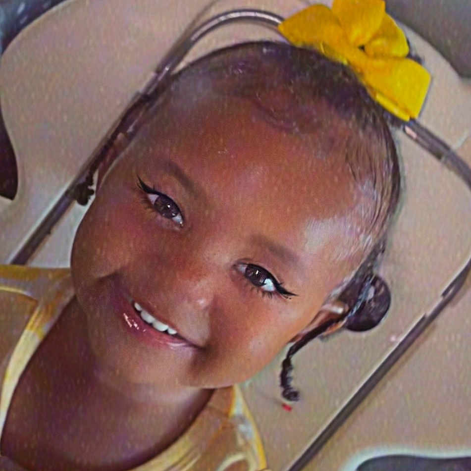 Marcia joined the competition — help win amazing prizes! child, smiling, yellow_bow, face, portrait, hair, digital_makeup, vintage_filter, timestamp, closeup, happy, yellow_clothing, cute, girl, indoors, retro, headshot, childhood, expression, joyful