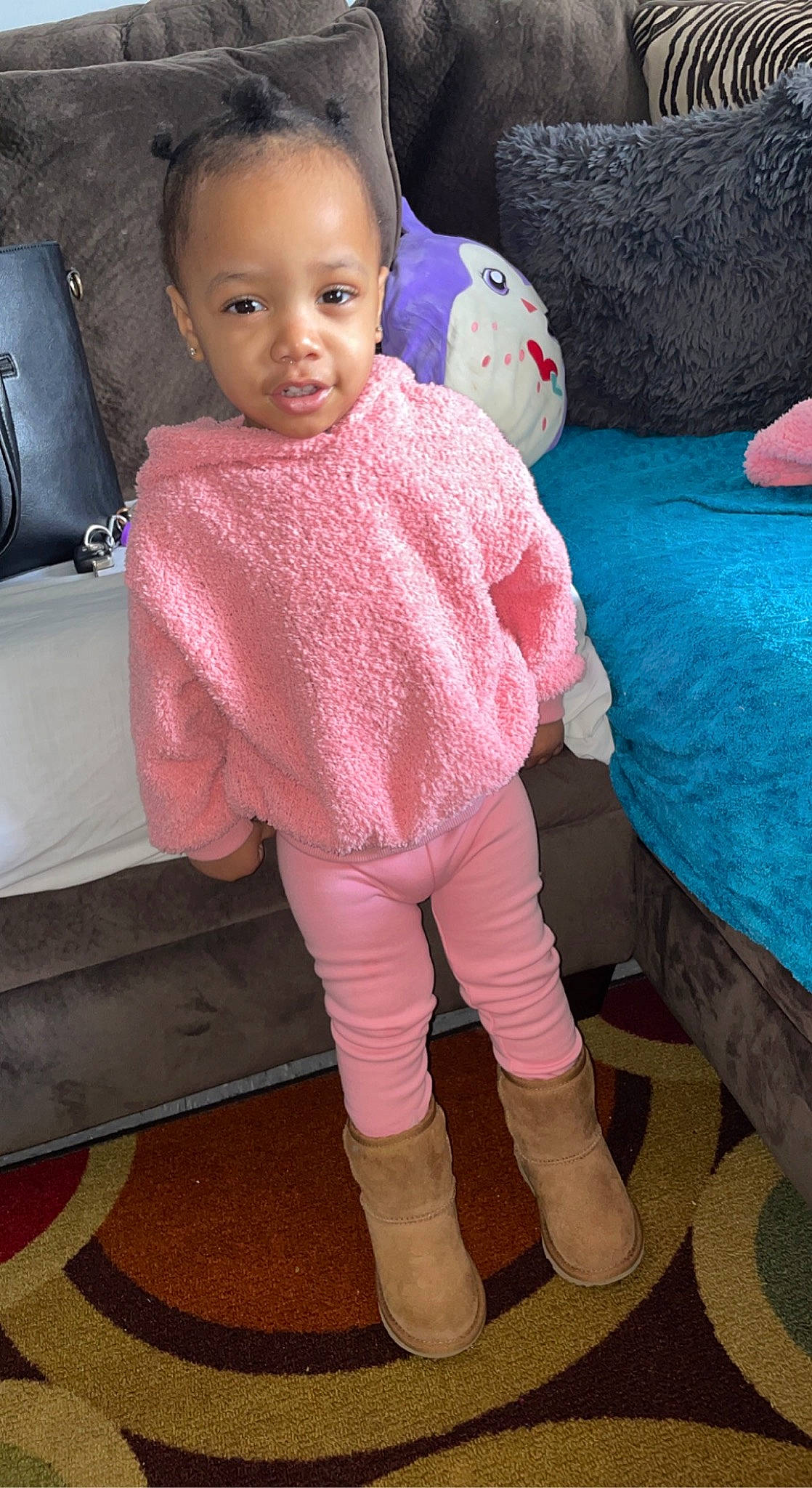 Jaiana is registered to the contest to win money with this photo: baby, baby_toddler_clothing, child, doll, dress, eye, flooring, human_leg, knee, leg, magenta, pattern, person, pink, skin, sleeve, sock, textile, thigh, toddler