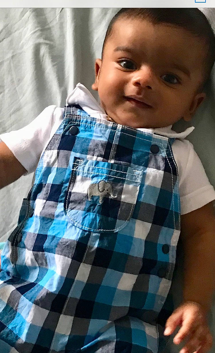 Neil is registered to the contest to win money with this photo: blue, boy, child, cool, design, fun, girl, infant, outerwear, pattern, person, plaid, product, smile, tartan, textile, toddler