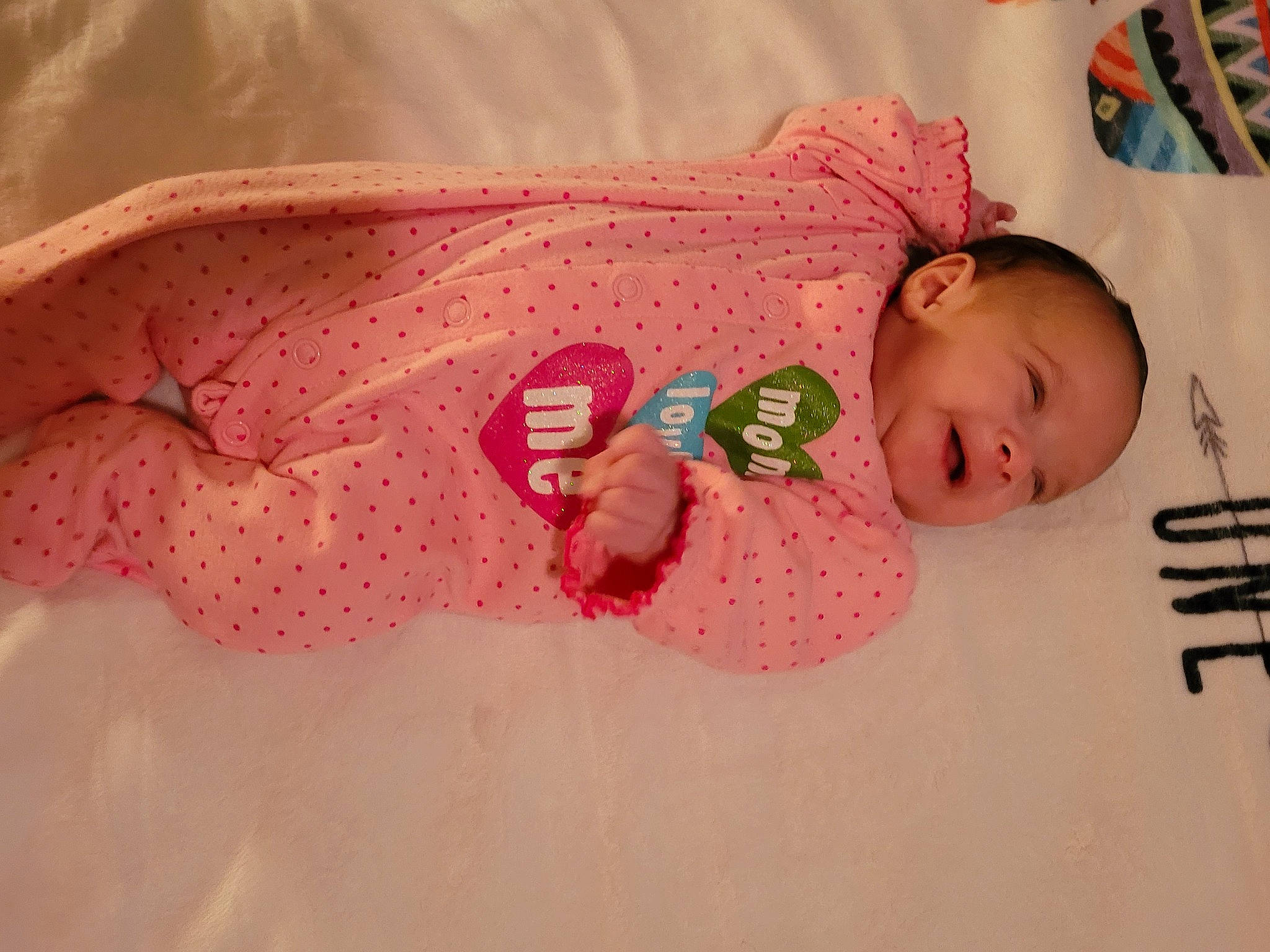 Kalayah joined the competition — help win amazing prizes! baby, baby_products, baby_safety, baby_toddler_clothing, cheek, child, comfort, dress, embellishment, head, headgear, human_body, linens, lip, pattern, peach, person, pink, skin, sleeve